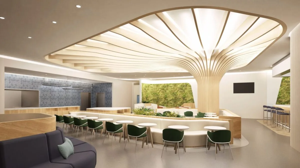 Moderne Flughafenlounge mit organischer Deckeninstallation, zentraler Sitzinsel, grünen Polstersesseln und begrünten Wandflächen